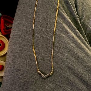 14kt 5.83 grams of gold with  1.01 ctw in diamonds